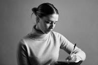 Black and White Portrait of Woman Writing