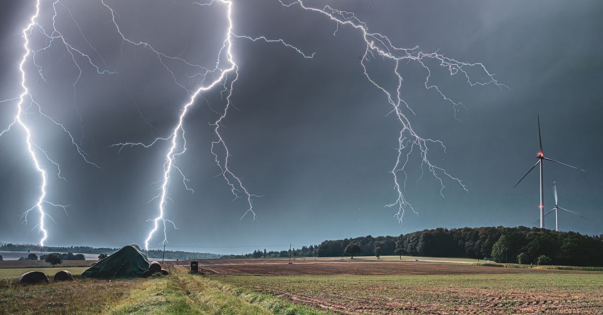 Wind Strikes Dramatic Lightning Strikes Over Rural Wind Farm · Free Stock Photo