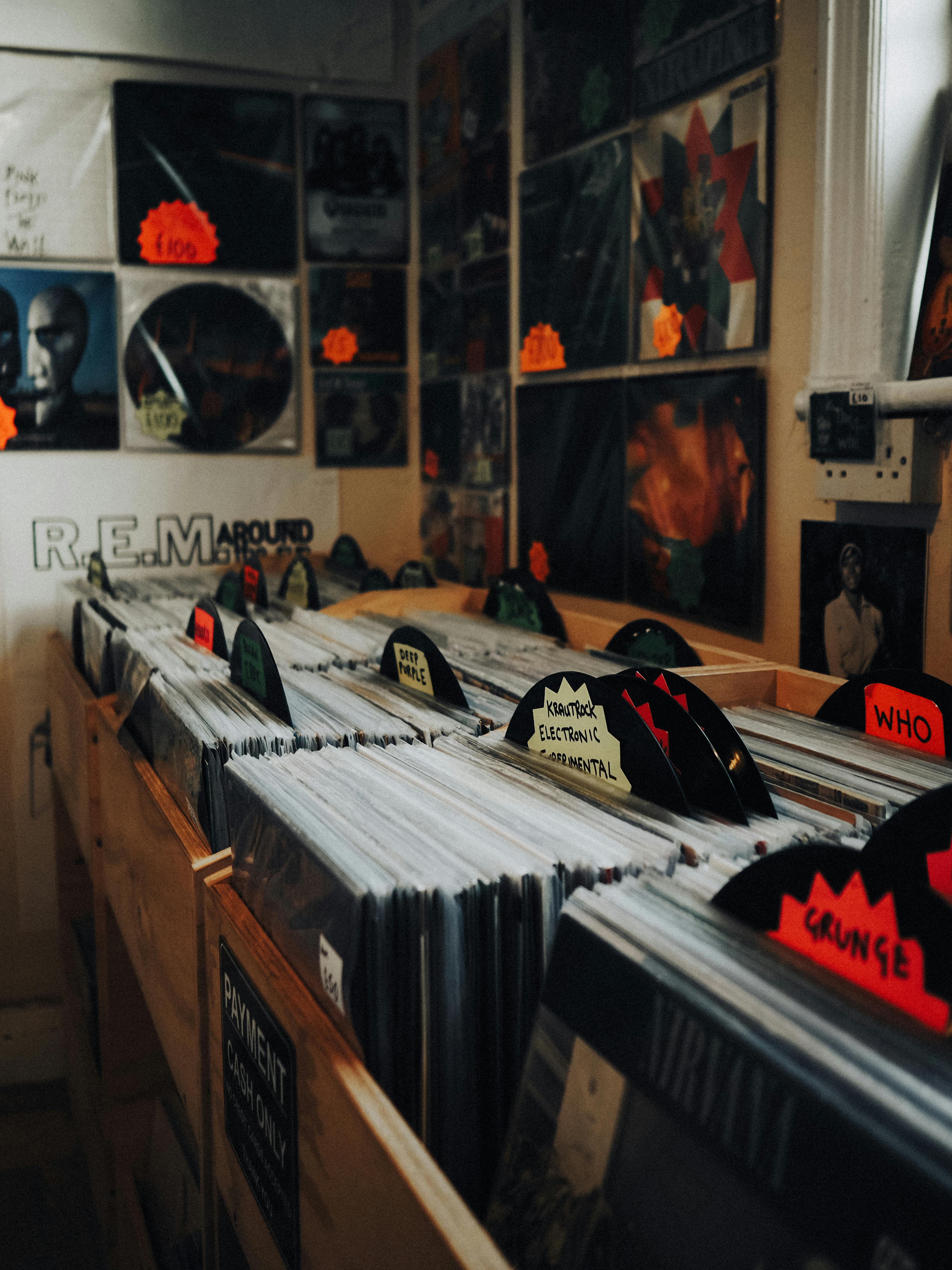 Explore a charming vinyl record store in Abergele, Wales, featuring classic albums and vibrant decor.