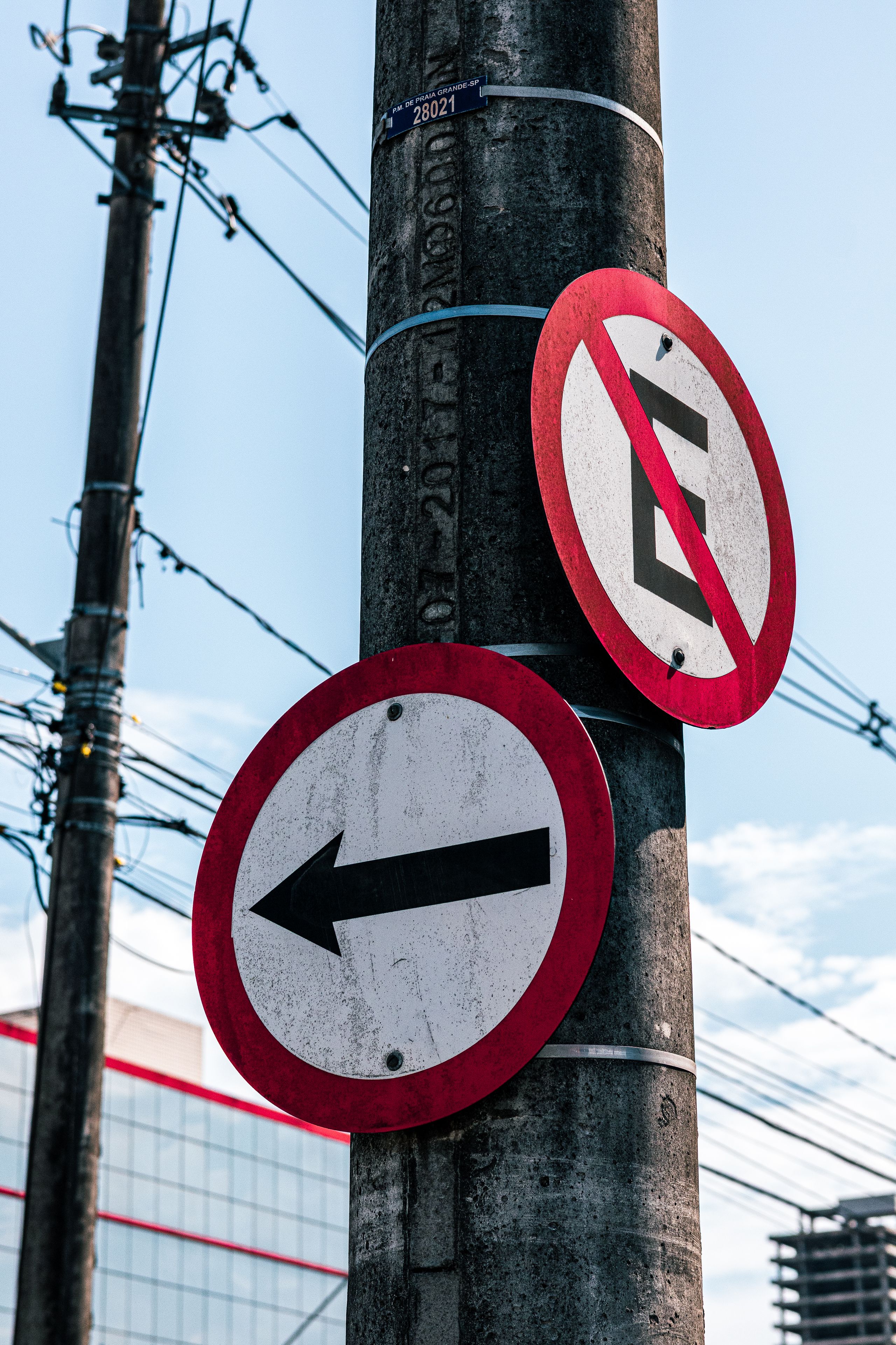 Urban Traffic Signs on Utility Pole · Free Stock Photo