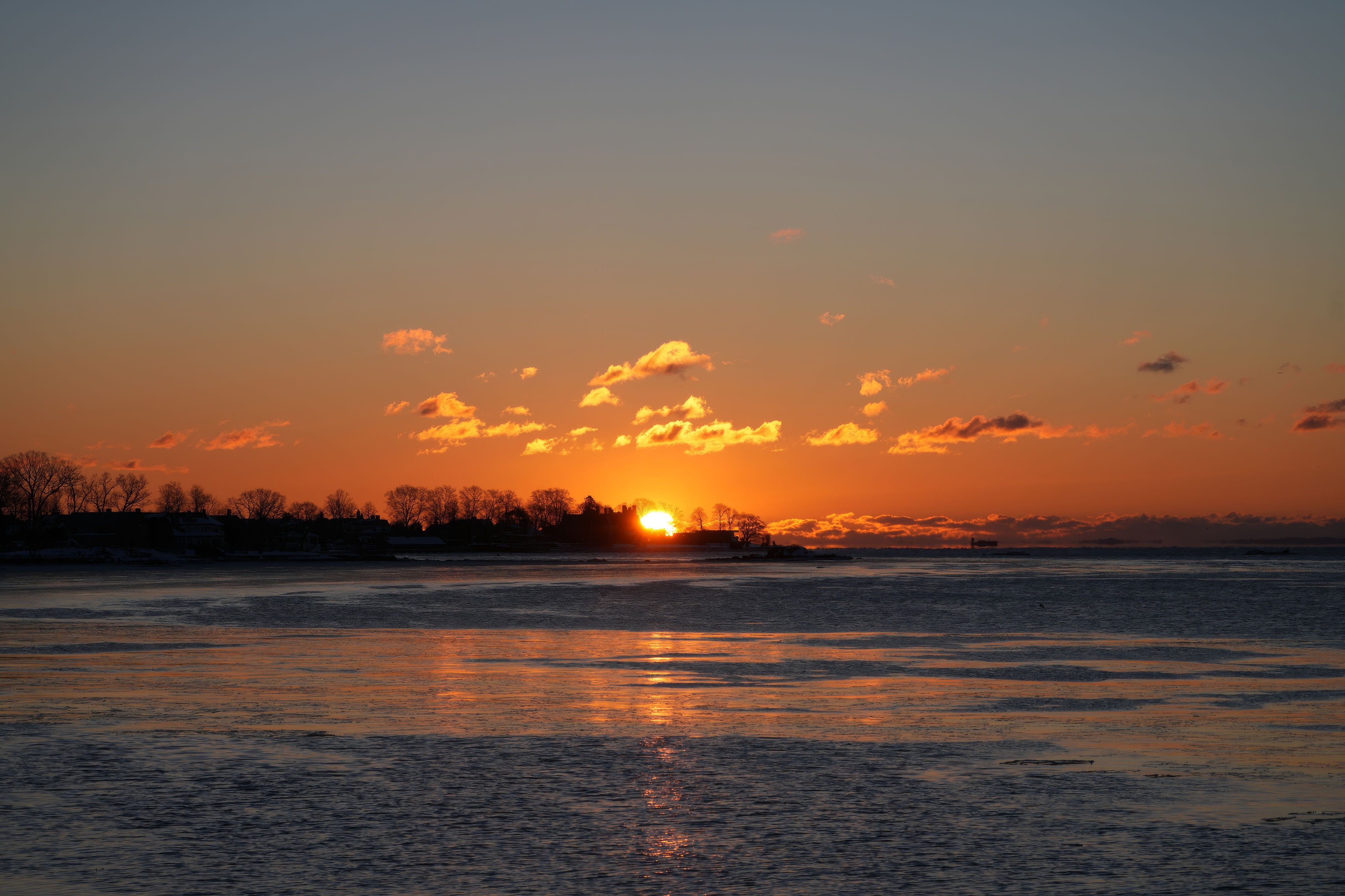 Stunning Winter Sunset Over Frozen Lake Landscape · Free Stock Photo