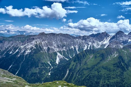Experience the serene beauty of Stubaier Alpen in Tirol with a stunning mountain vista under a clear blue sky.