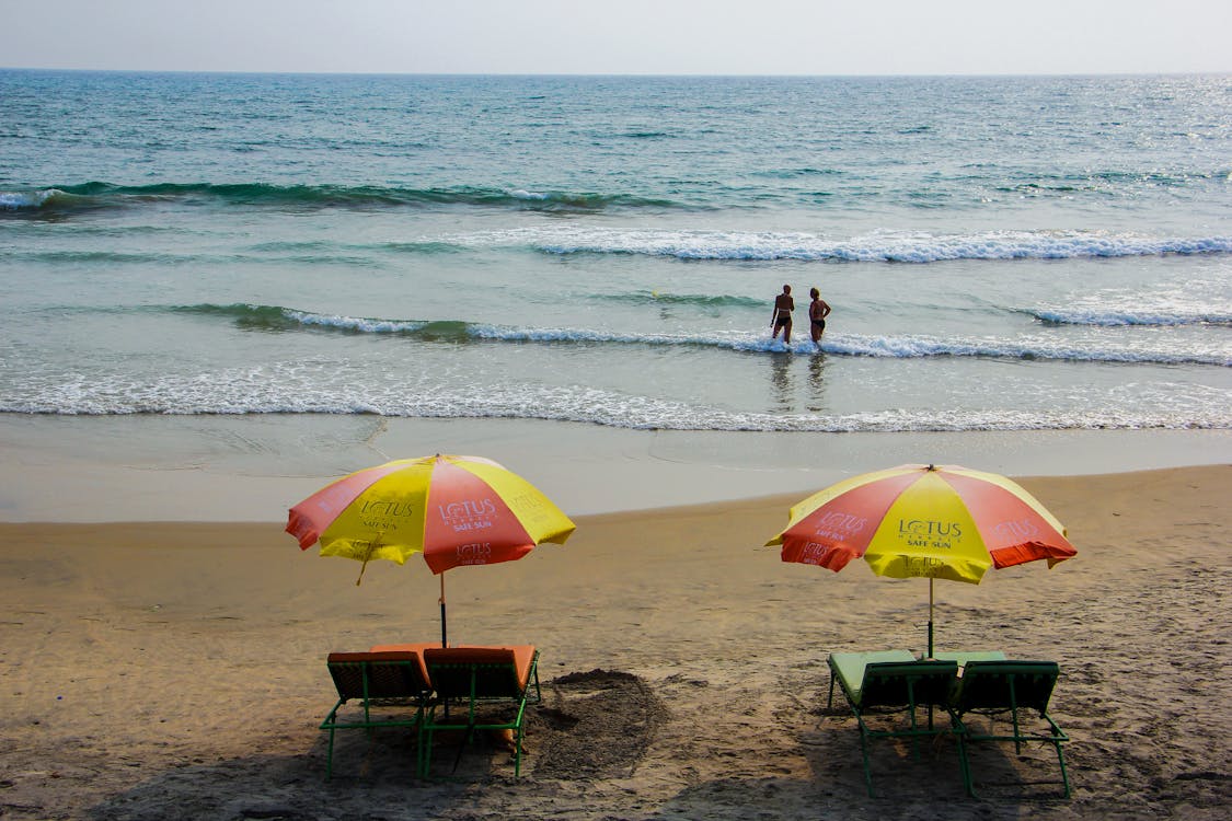 Free Two People Standing In Beach Stock Photo