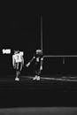 Black and White Night Football Game Scene