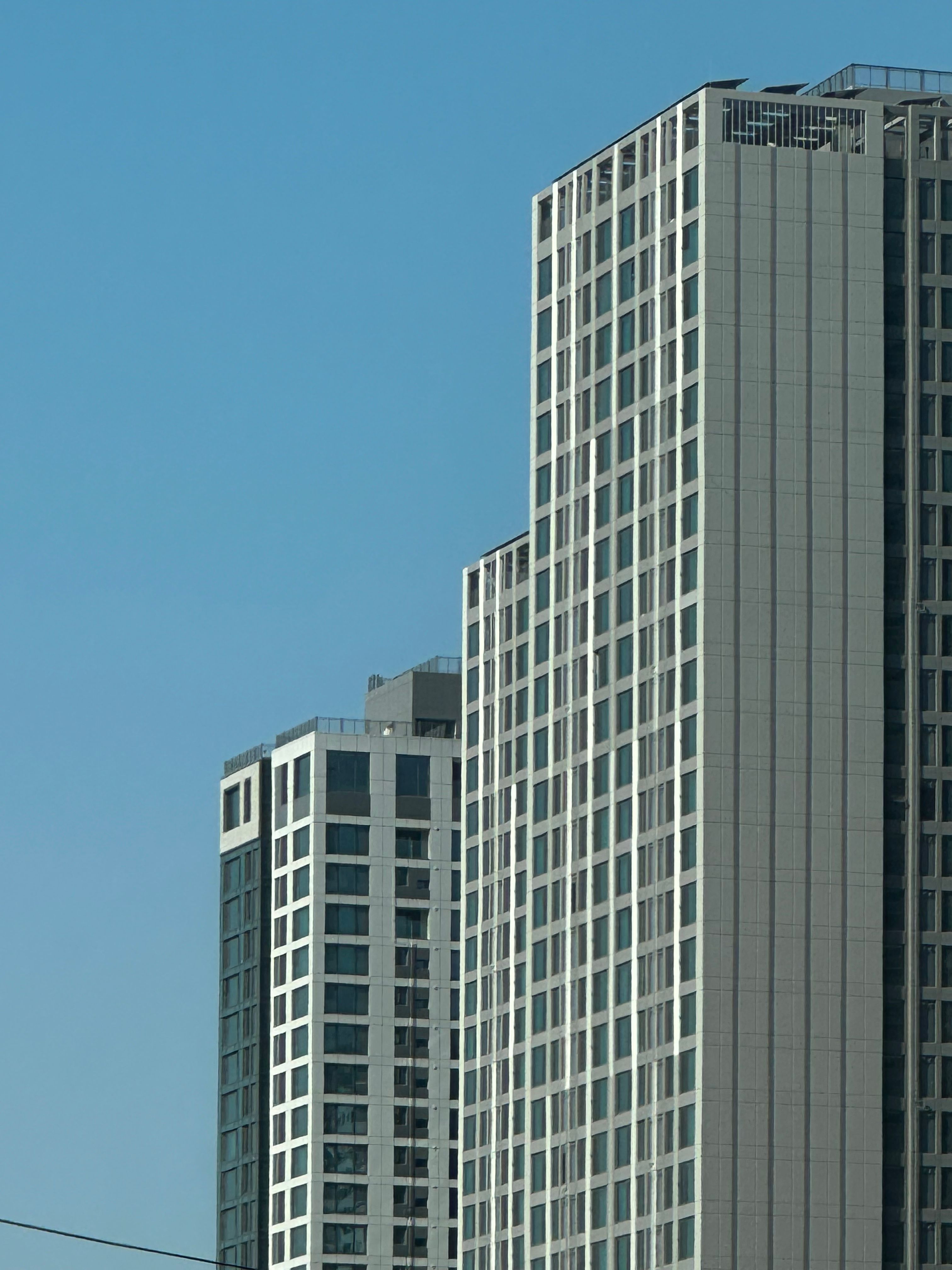 modern high rise buildings against clear sky