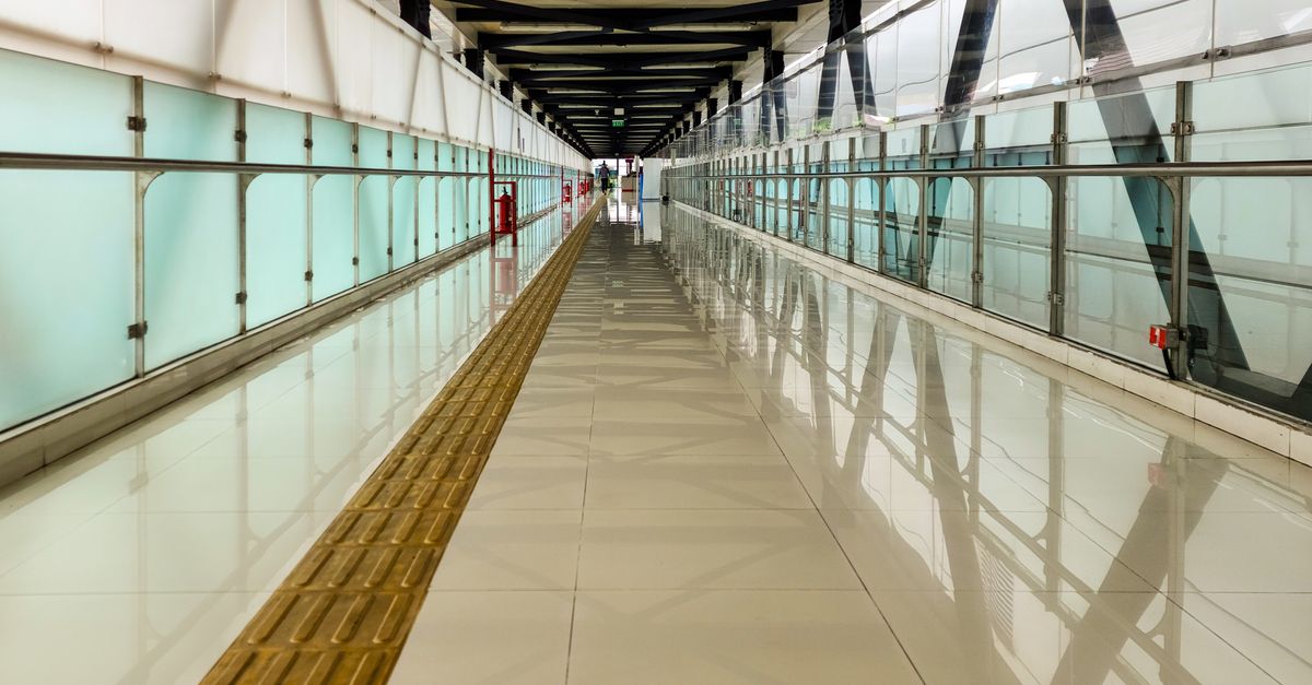 Yellow Guide Path Modern Indoor Walkway with Yellow Guide Path · Free Stock Photo