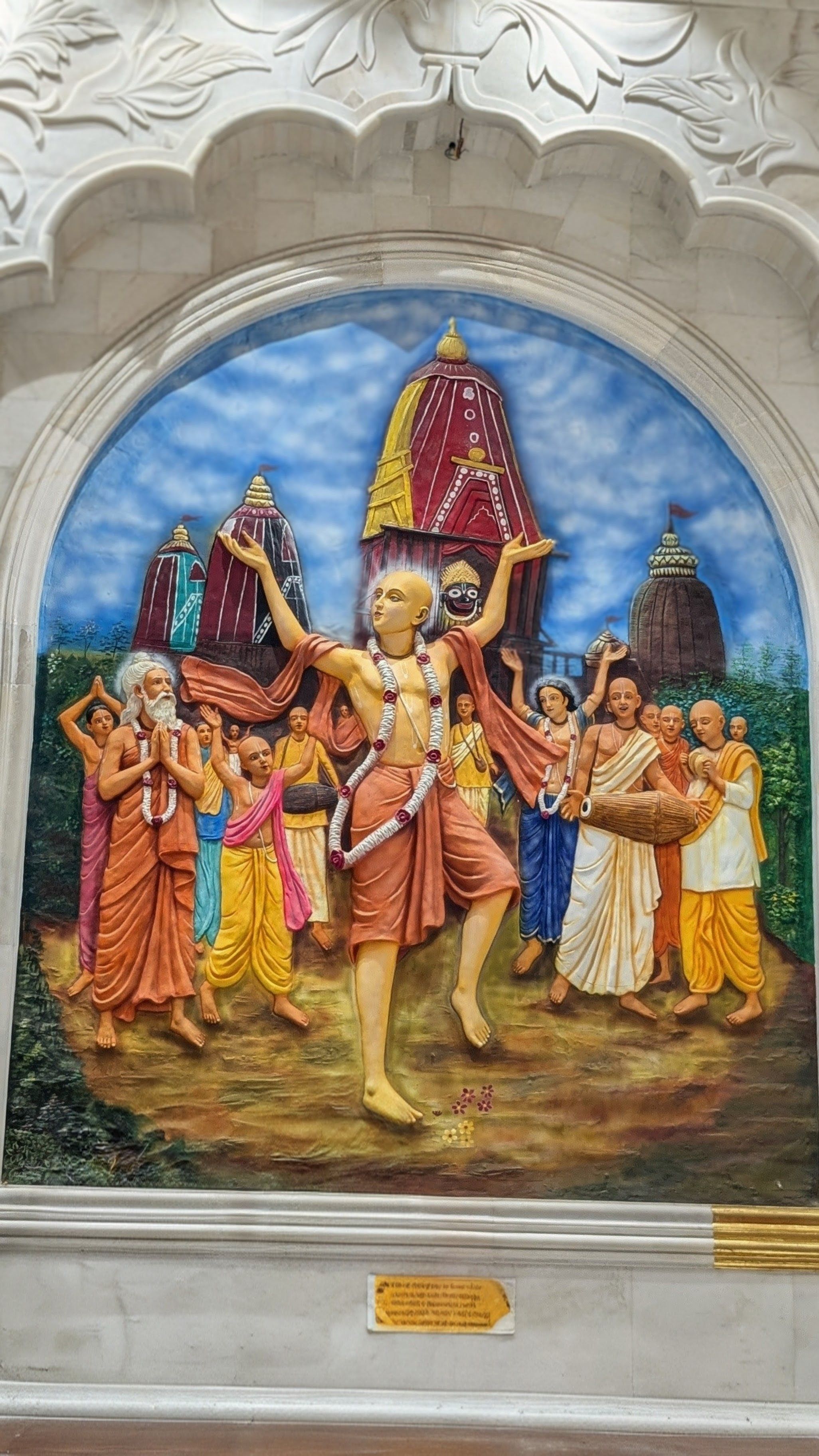 Vibrant mural depicting a religious procession with deities in Navi Mumbai.