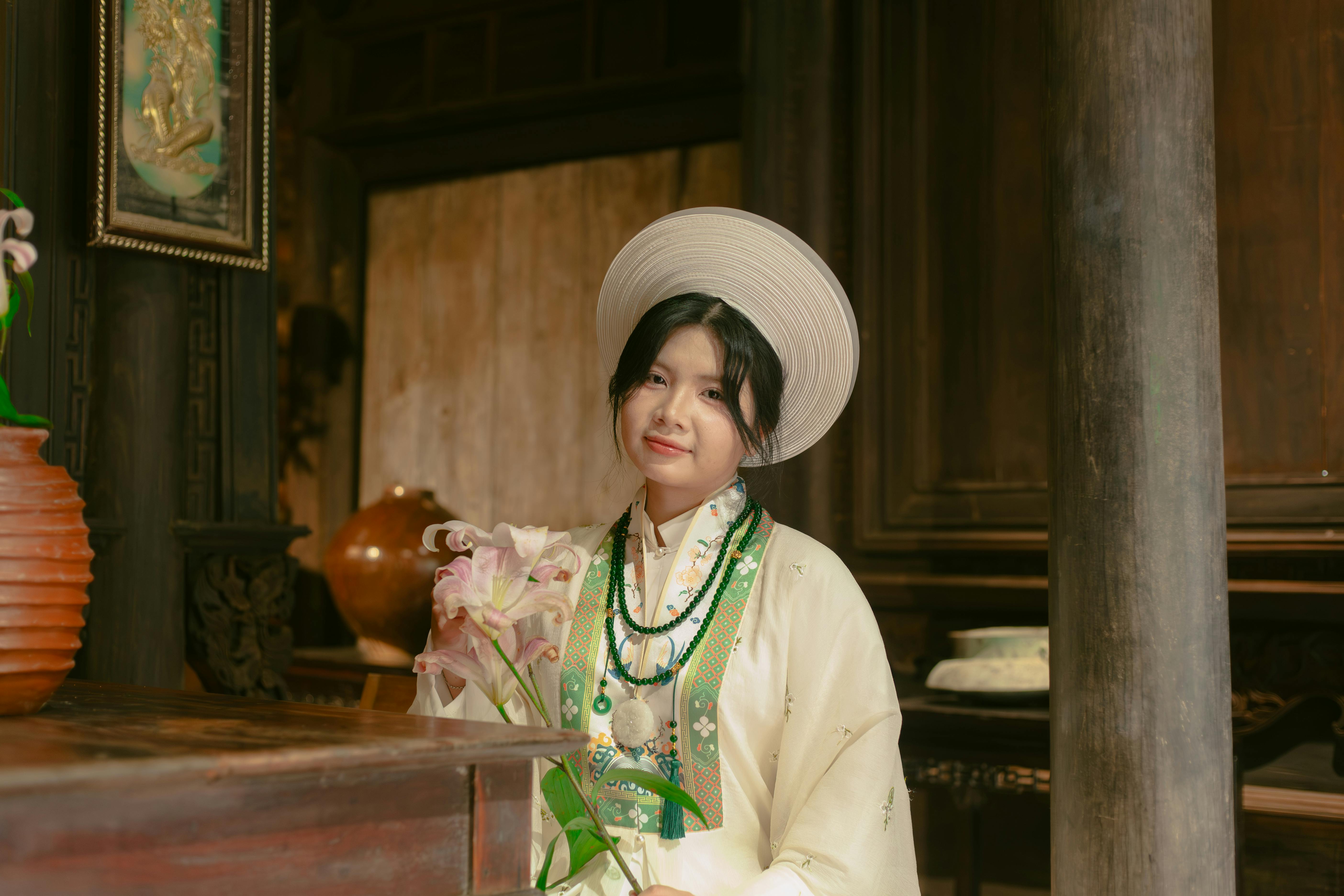 Traditional Asian Attire Portrait with Floral Accent