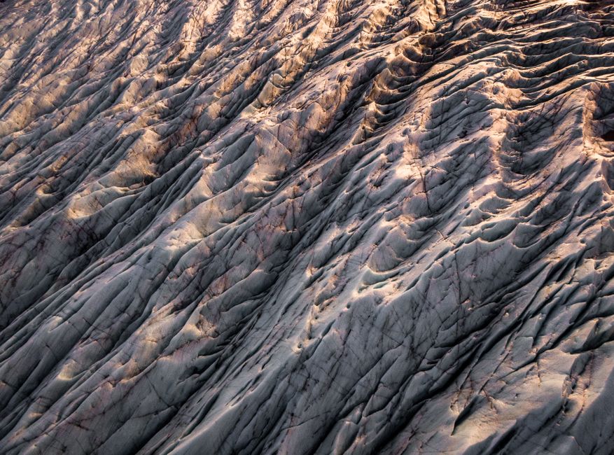 Aerial view of glacier patterns showcasing natural beauty in Iceland's Svinafellsjokull.