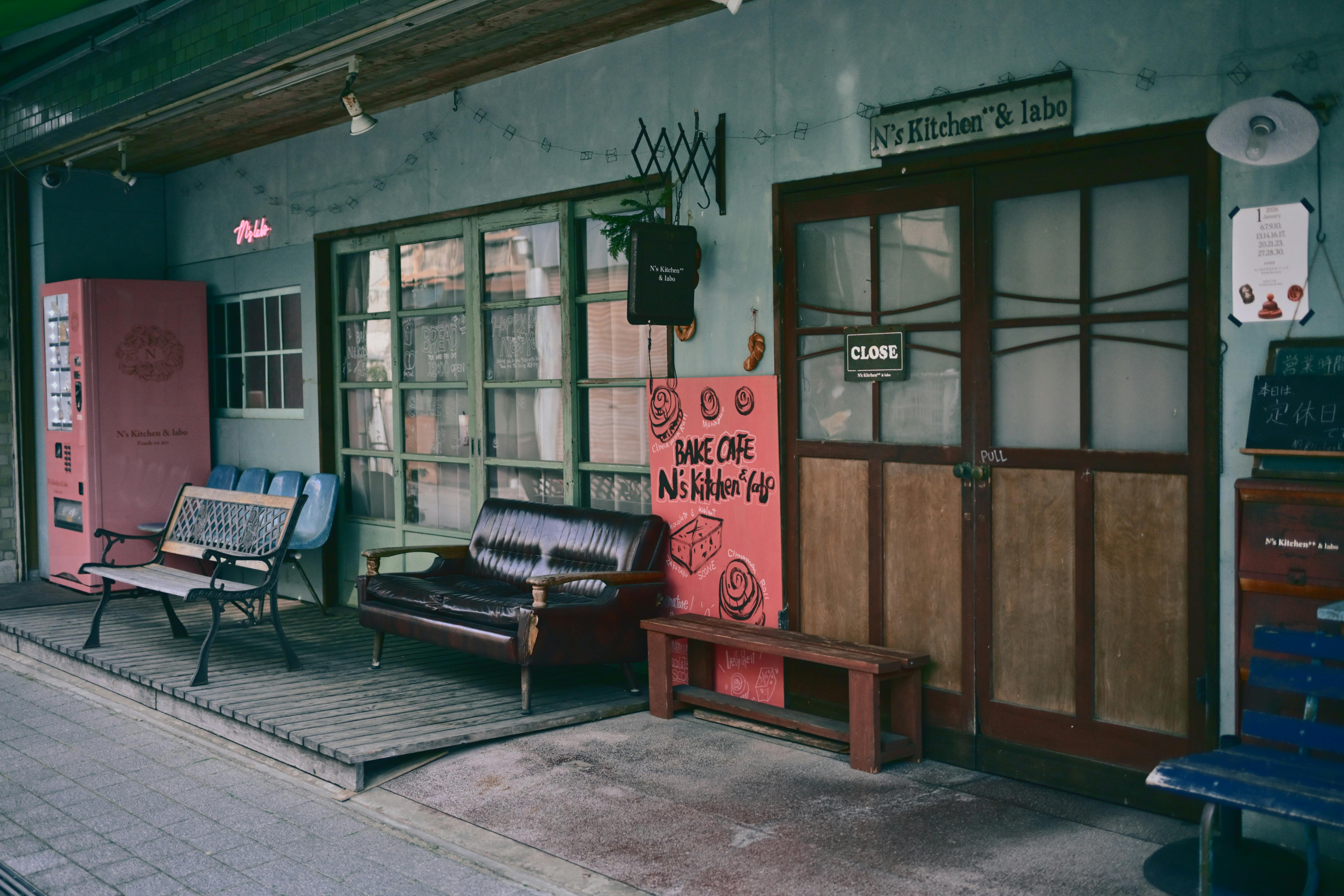 Charming Vintage Cafe Entrance with Outdoor Seating