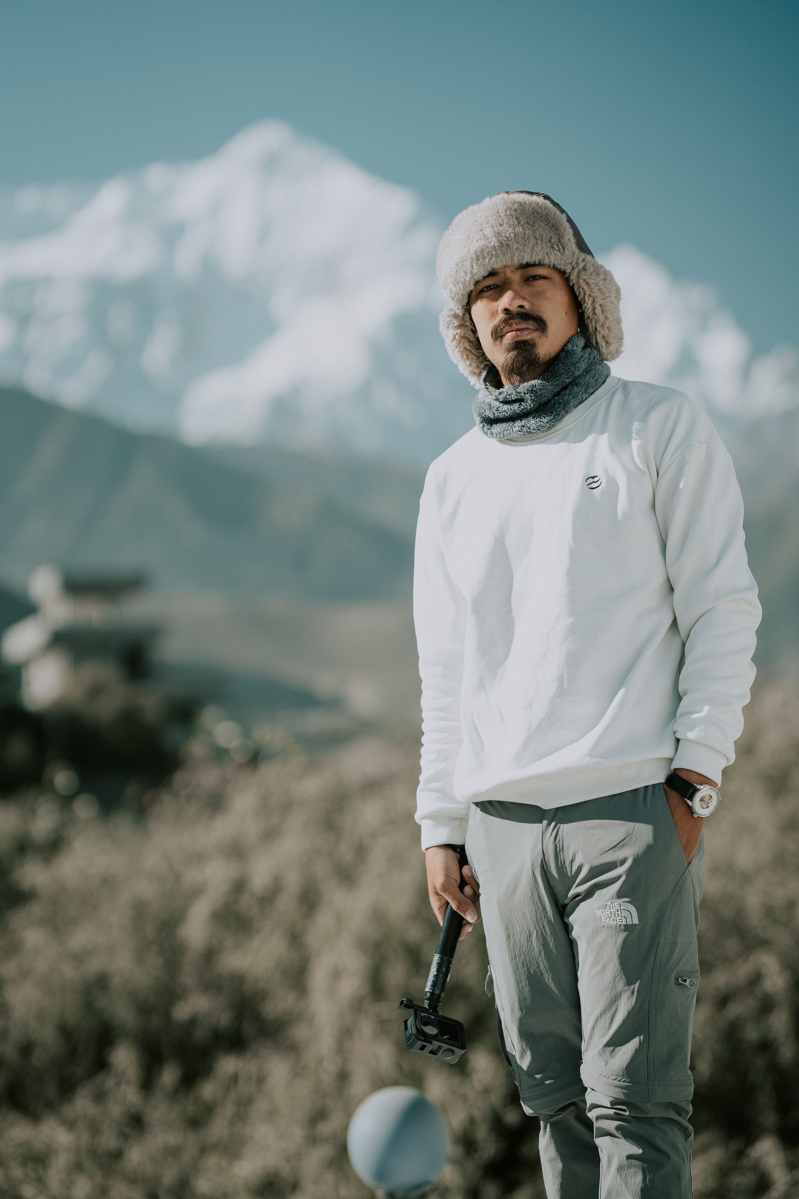 Man in winter clothing stand
