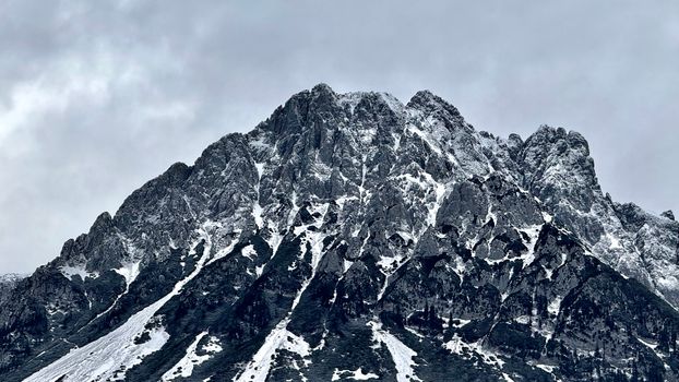 Majestic snow-capped peaks in Kufstein, Tyrol, Austria showcasing winter's beauty.