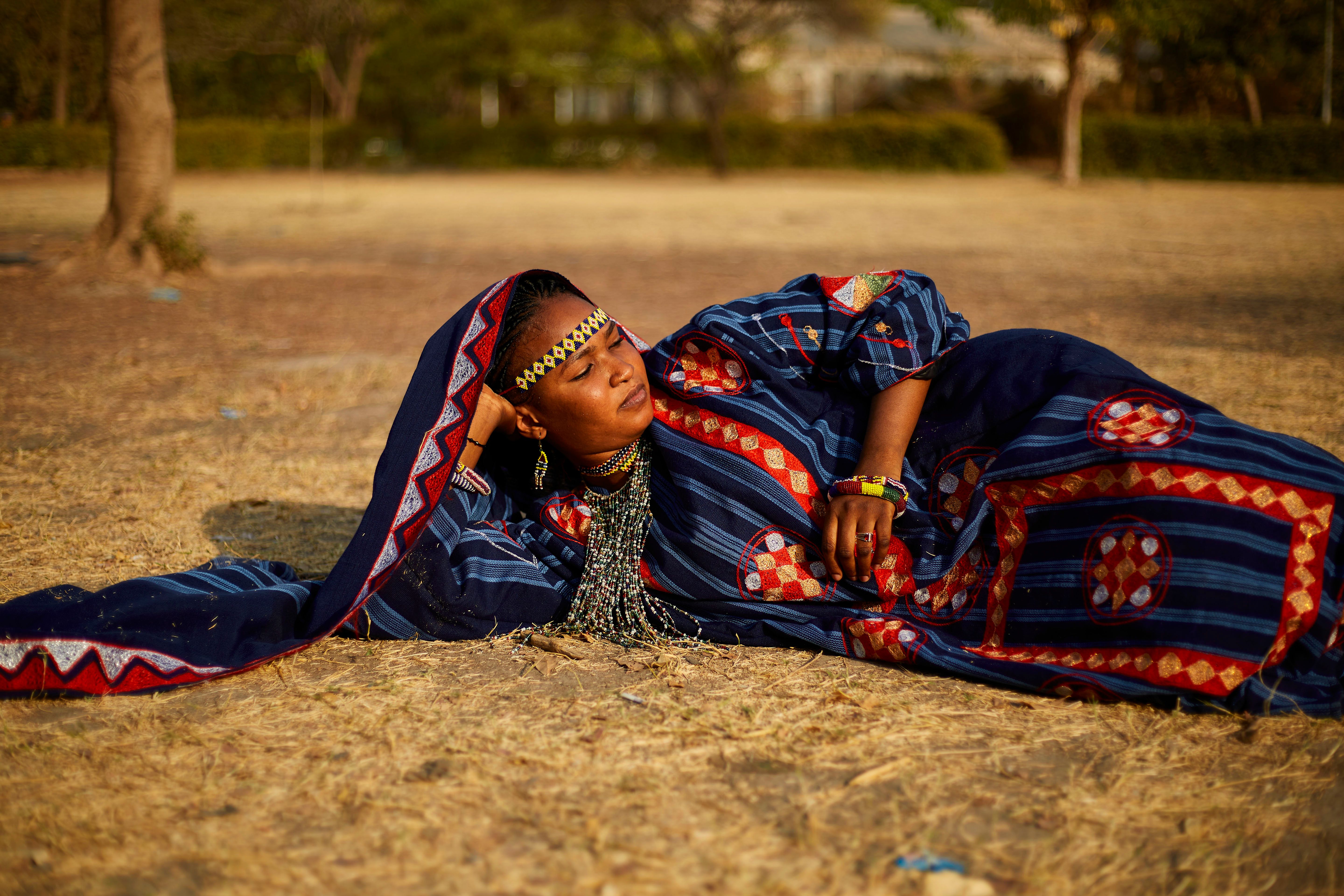 Elegant Hausa Woman in Traditional Attire Outdoors · Free Stock Photo