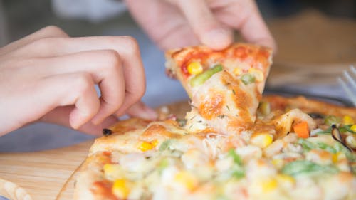 Free Person Holding Pizza Stock Photo