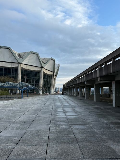 Free Capture of the iconic modern architecture at Ruhr-University Bochum with a dramatic sky. Stock Photo