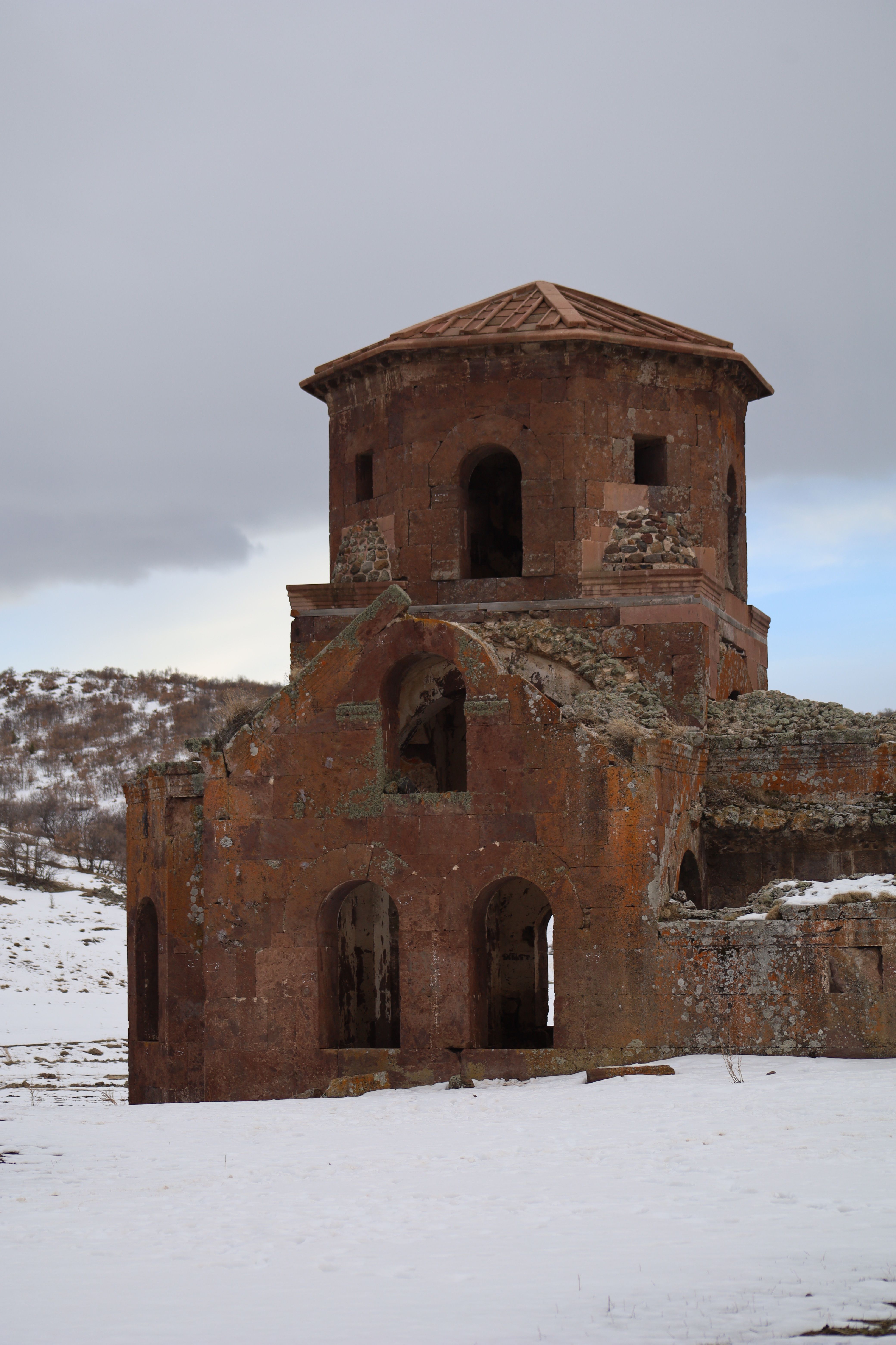 Historical ruins in snowy Aksaray, showcasing stunning winter scenery.