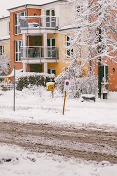 Snow-covered residential building in Bad Hersfeld, Germany during winter.
