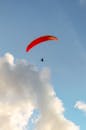 Paraglider Soaring Amidst Clouds in Brazil