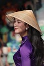 Elegant Woman in Traditional Vietnamese Attire Outdoors