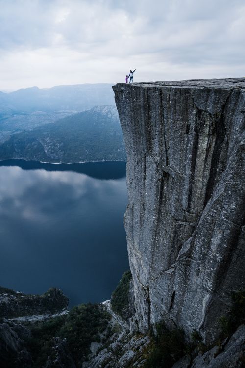 Free Stunning view of Preikestolen cliff in Rogaland, Norway. Perfect for adventure travel inspiration. Stock Photo