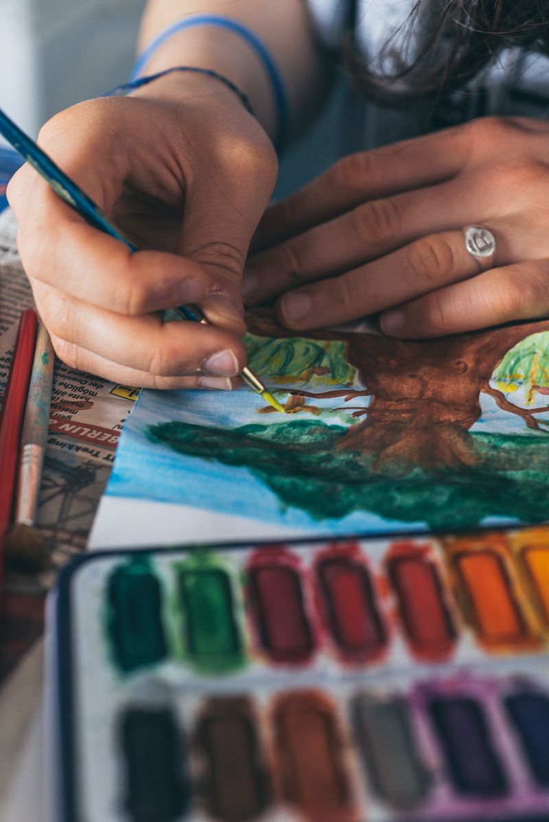 Customer using magnifying glass for painting hobby