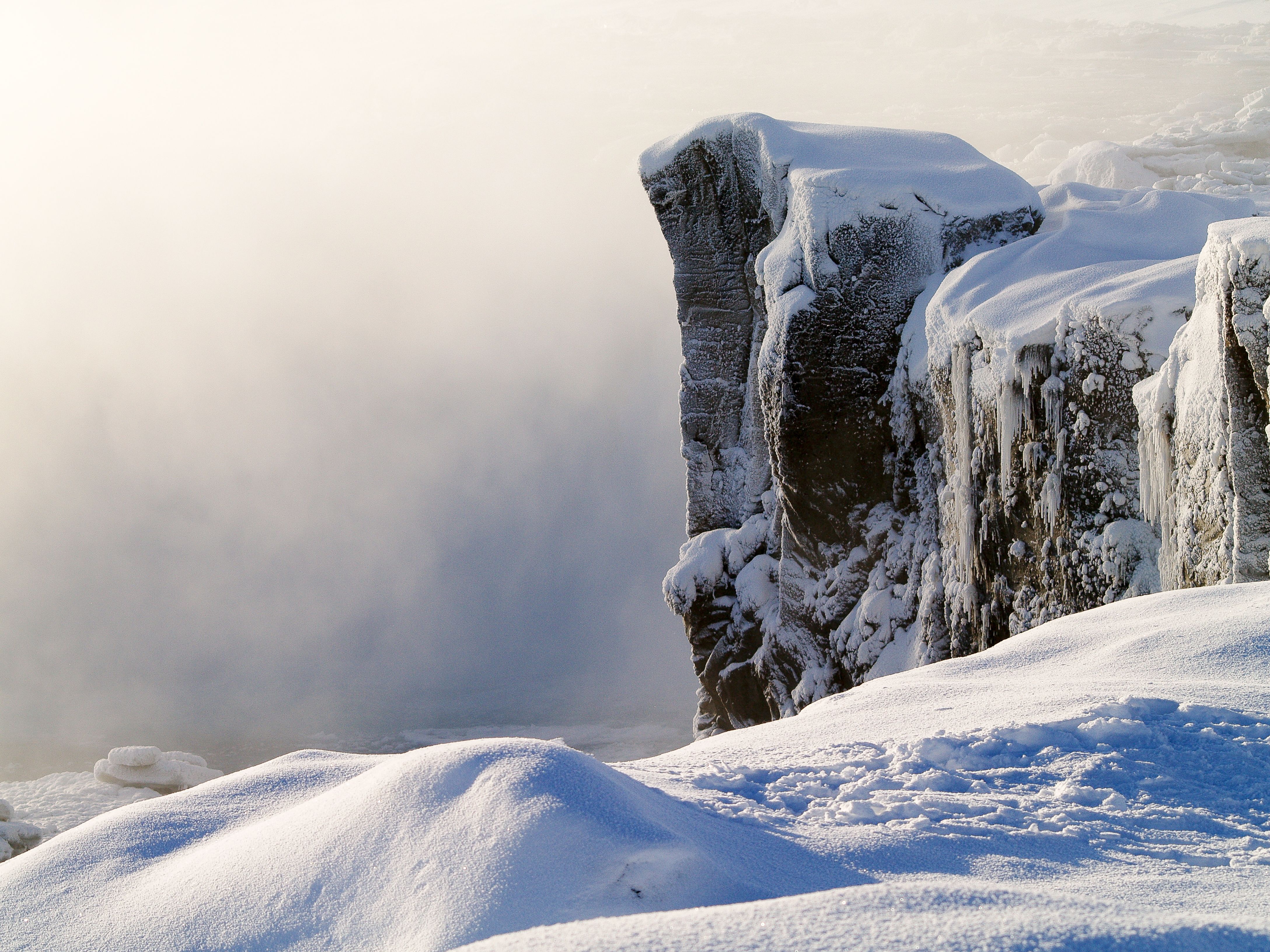 Frozen Cliff in Snowy Winter Landscape · Free Stock Photo