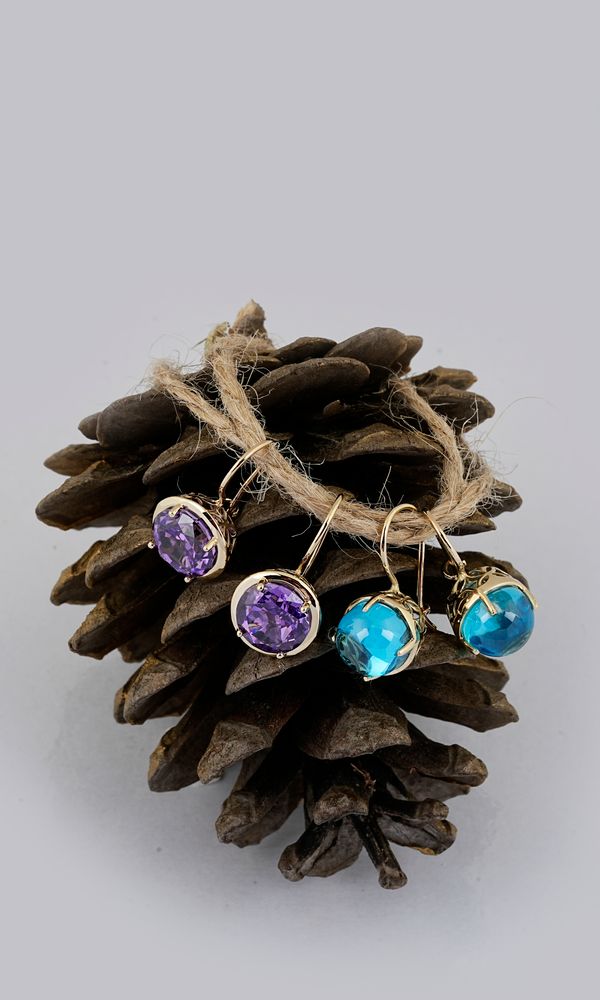 Elegant gemstone earrings in blue and purple tones