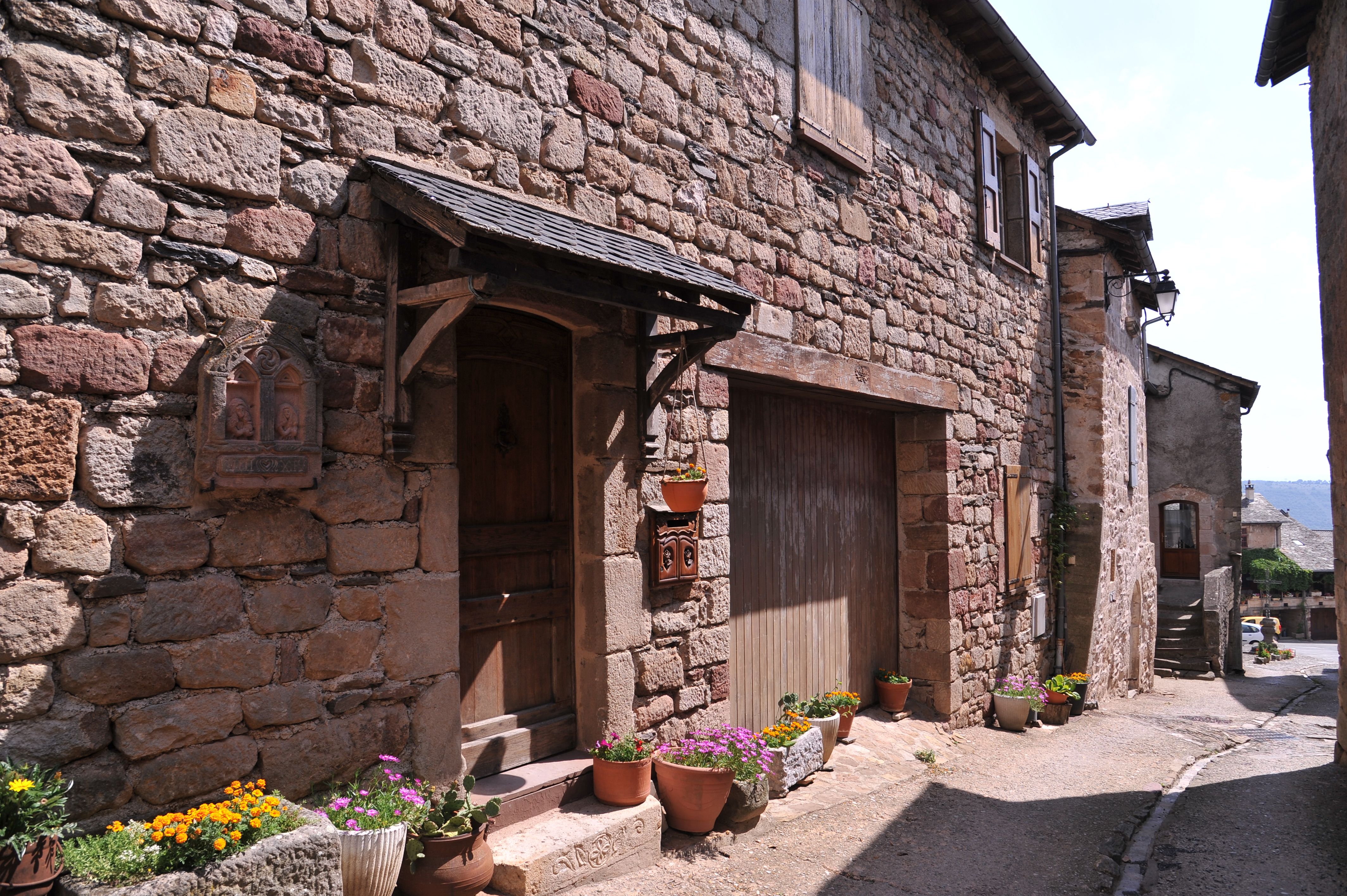 Charming Village Street with Stone Houses · Free Stock Photo