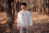 Young Man Walking in Forest in Kon Tum, Vietnam