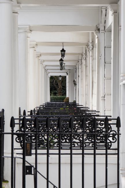 Georgian stucco-front townhouses with black ironwork in South Kensington, representing high-value London residential property held through corporate envelopes