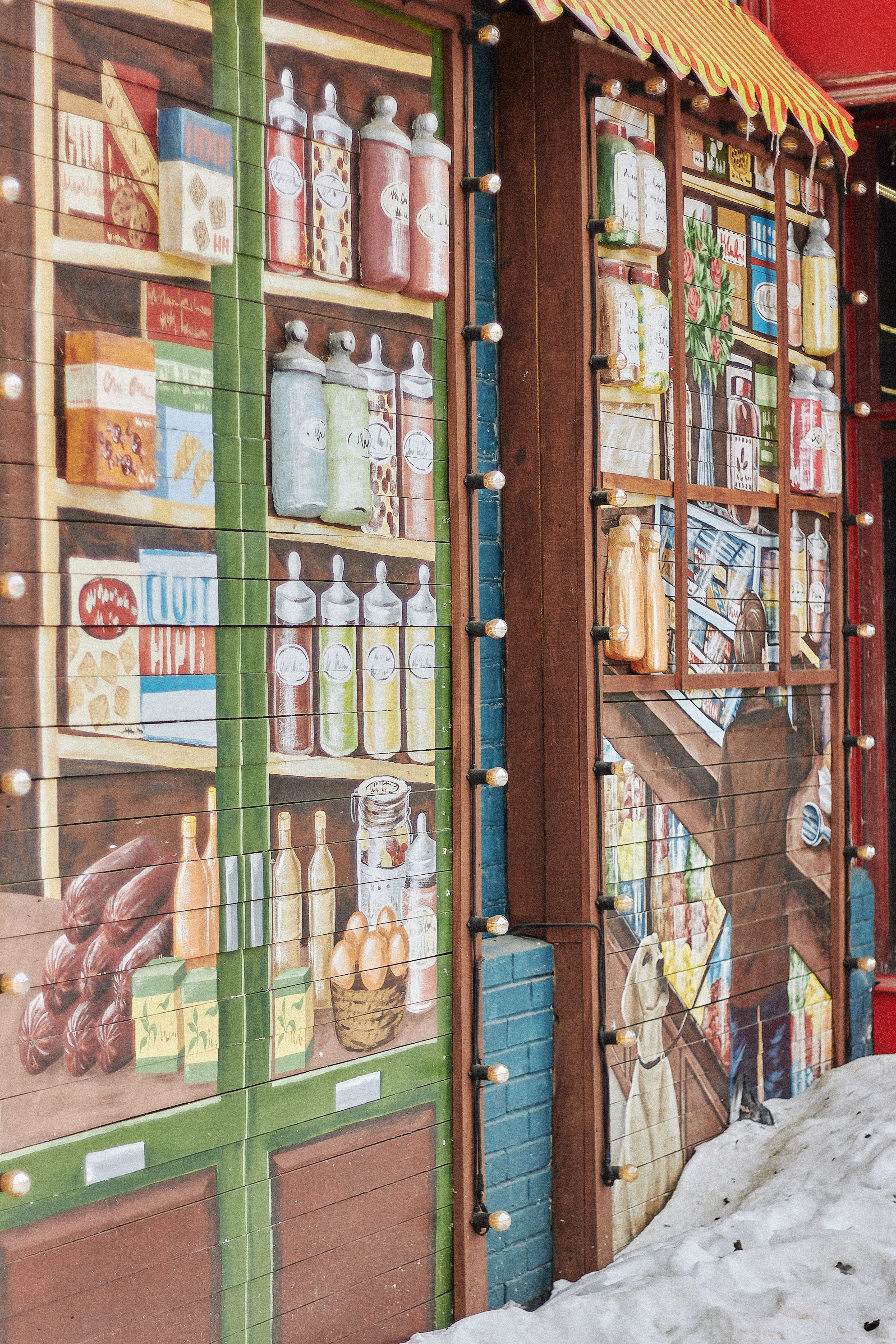 Vibrant Mural of Grocery Storefront with Snow · Free Stock Photo