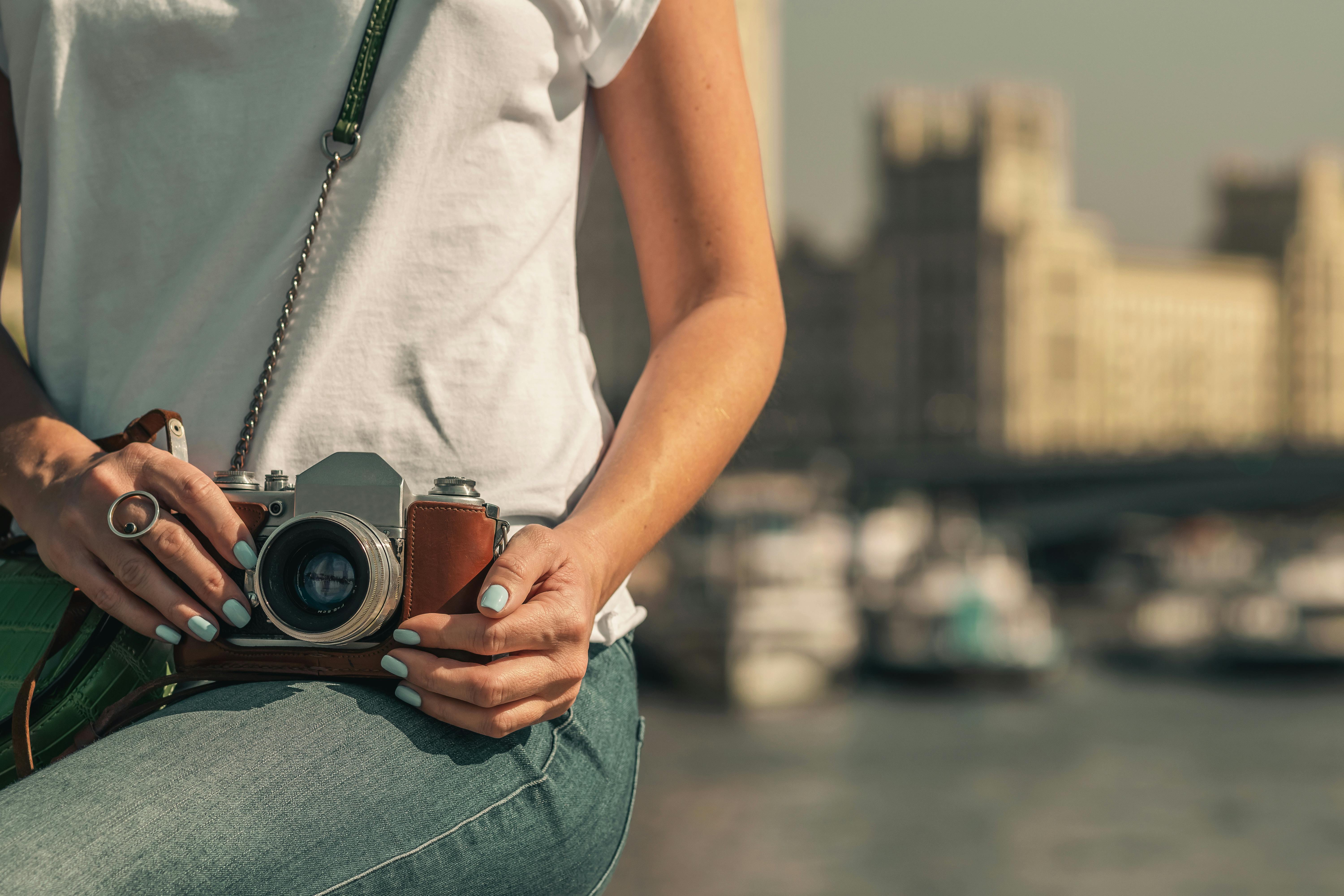 Person Holding Sony Dslr Camera \u00b7 Free Stock Photo