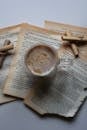Cozy Coffee Mug Surrounded by Vintage Book Pages