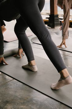 Engaging outdoor yoga session with focus on wellness and balance.