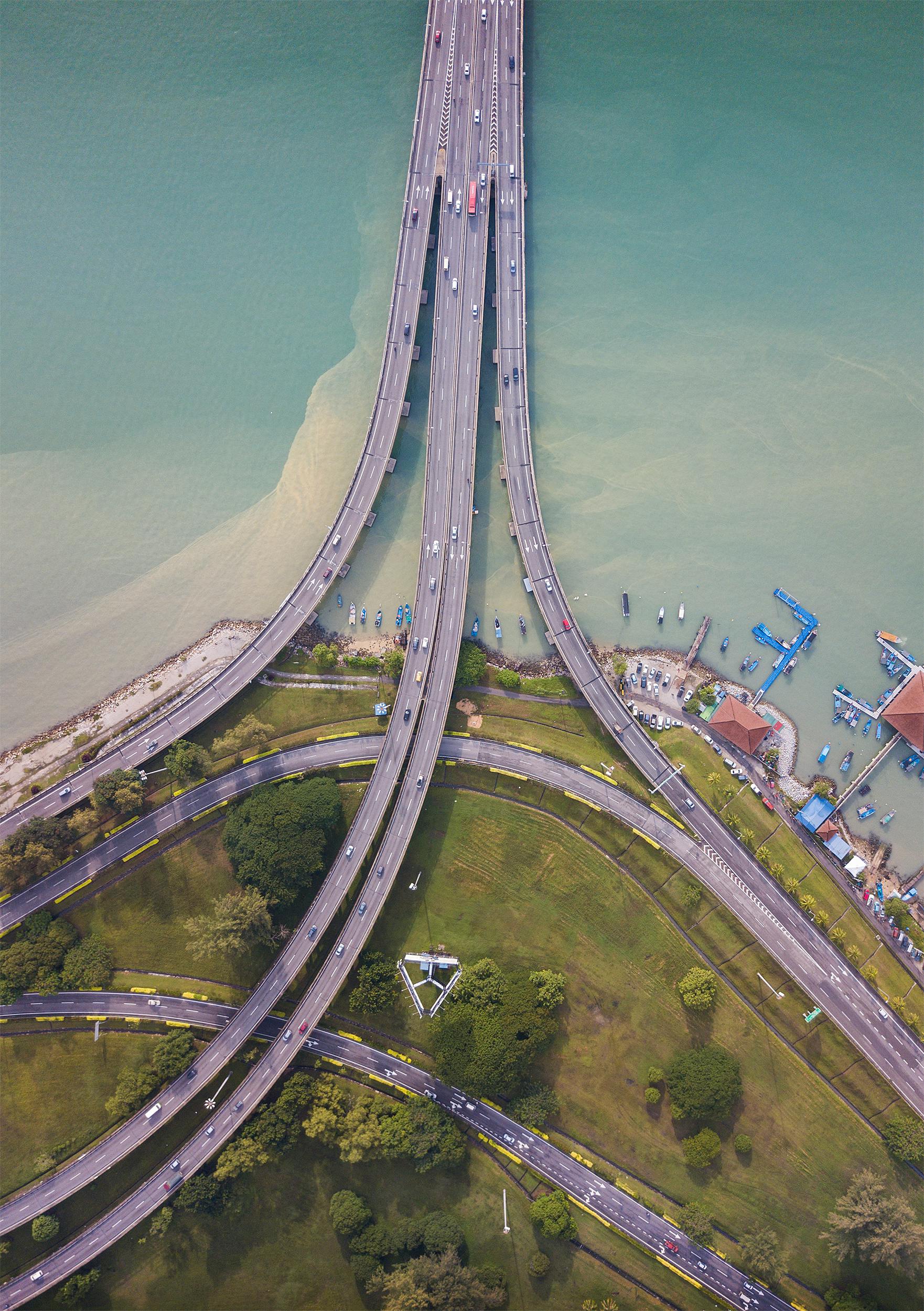 aerial view of a bridge on body of water