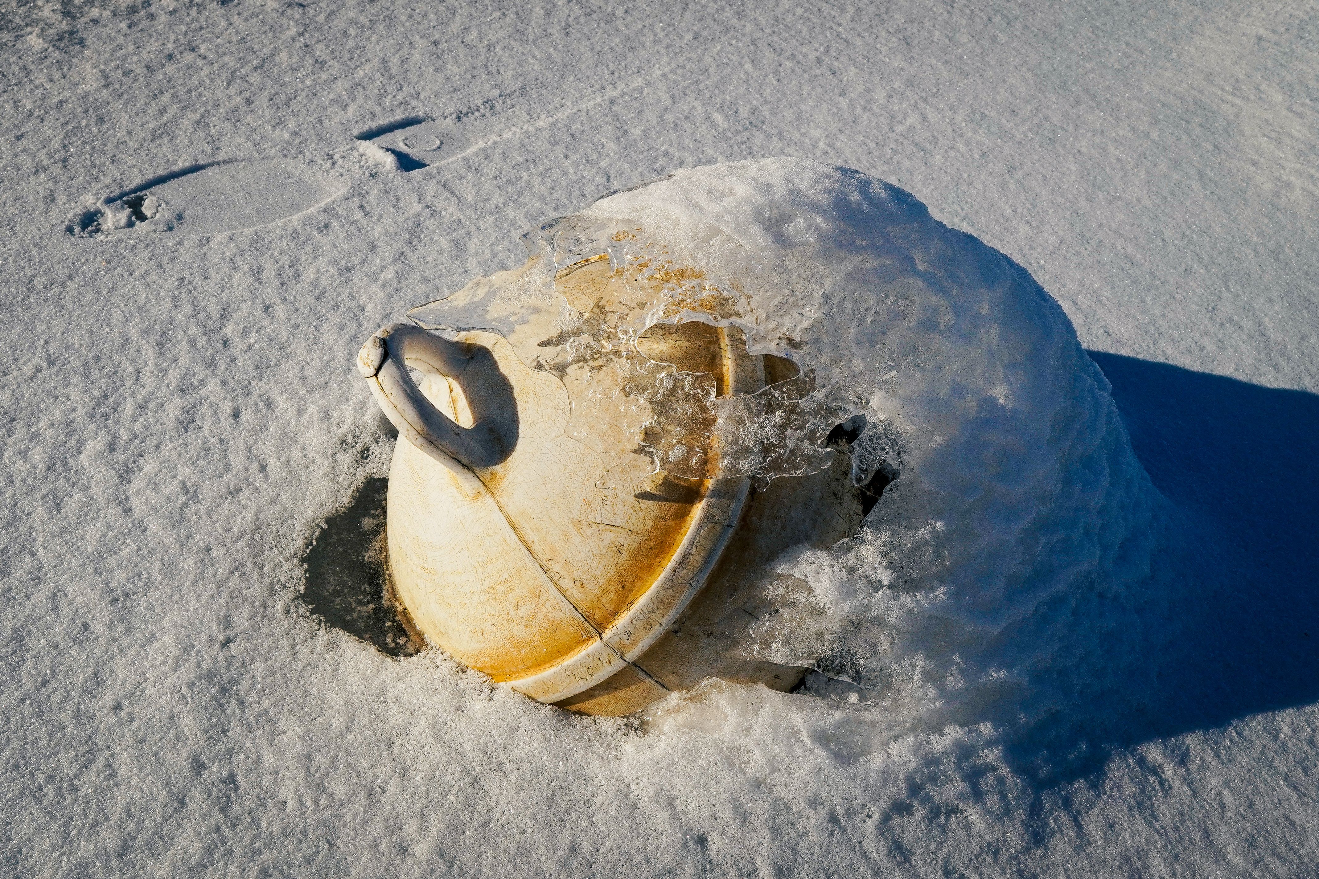 Frozen Buoy Partially Covered in Ice and Snow · Free Stock Photo