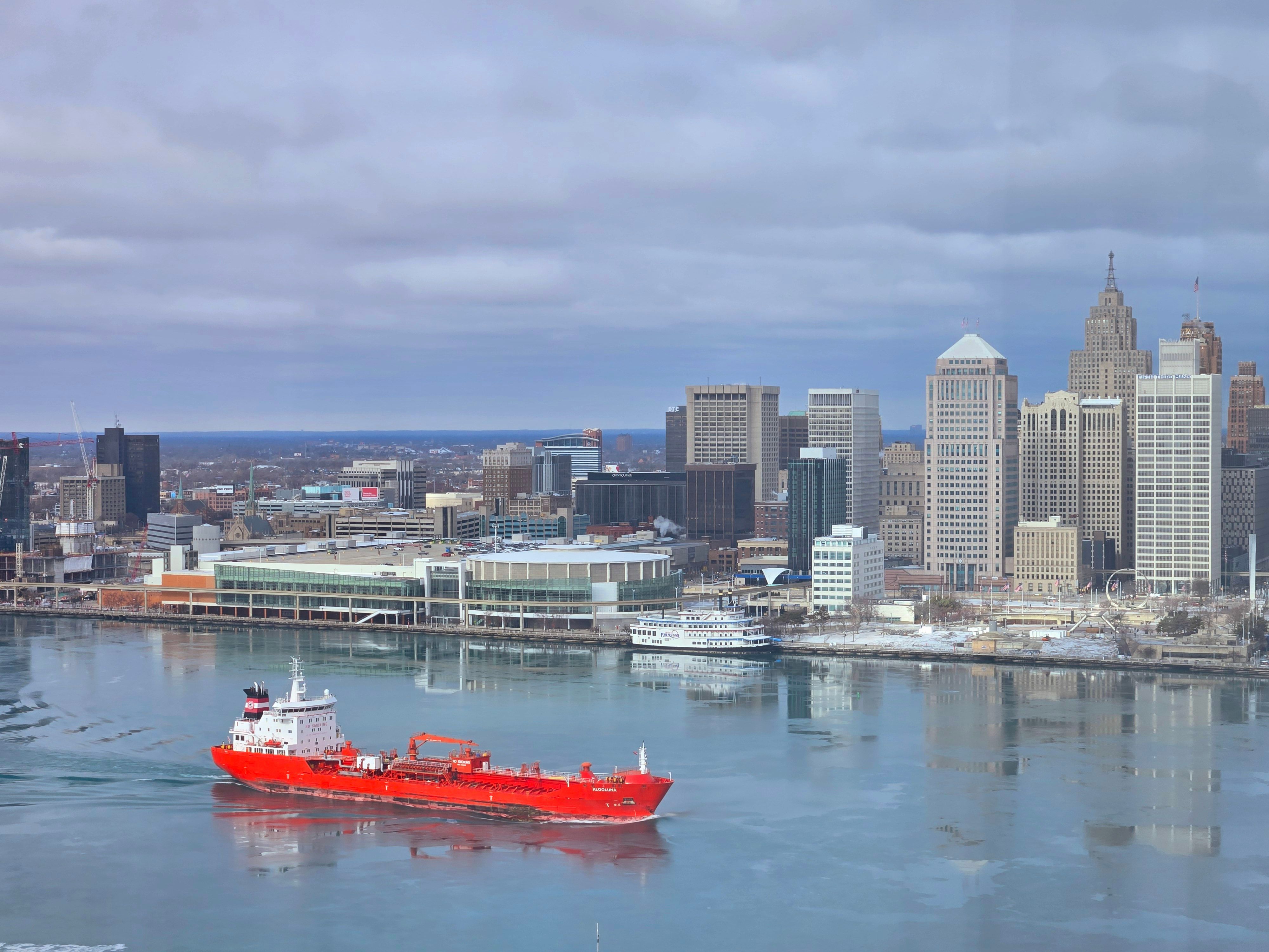 Vibrant Red Ship in Detroit City Skyline · Free Stock Photo