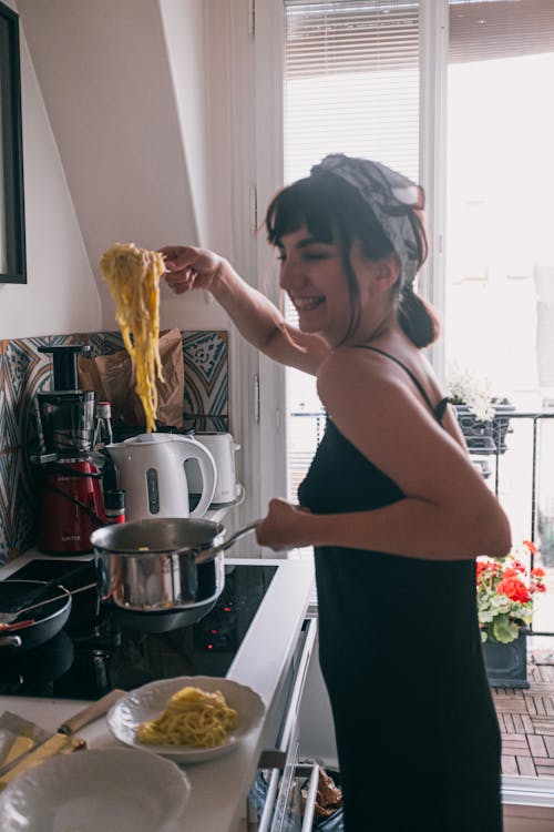 Photo Of Woman Holding Pan