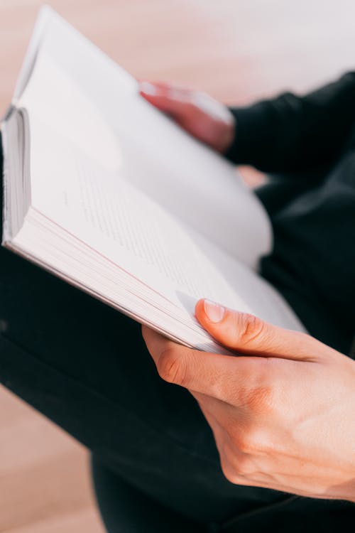 Free Photo of Person Holding A Book Stock Photo
