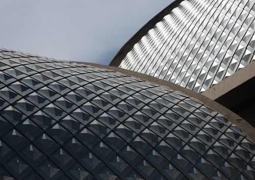 Free Close-up of modern architectural structure highlighting geometric patterns under daylight. Stock Photo