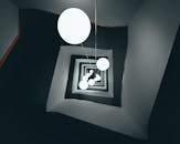 螺旋楼梯的迷人景色，搭配现代几何照明设计