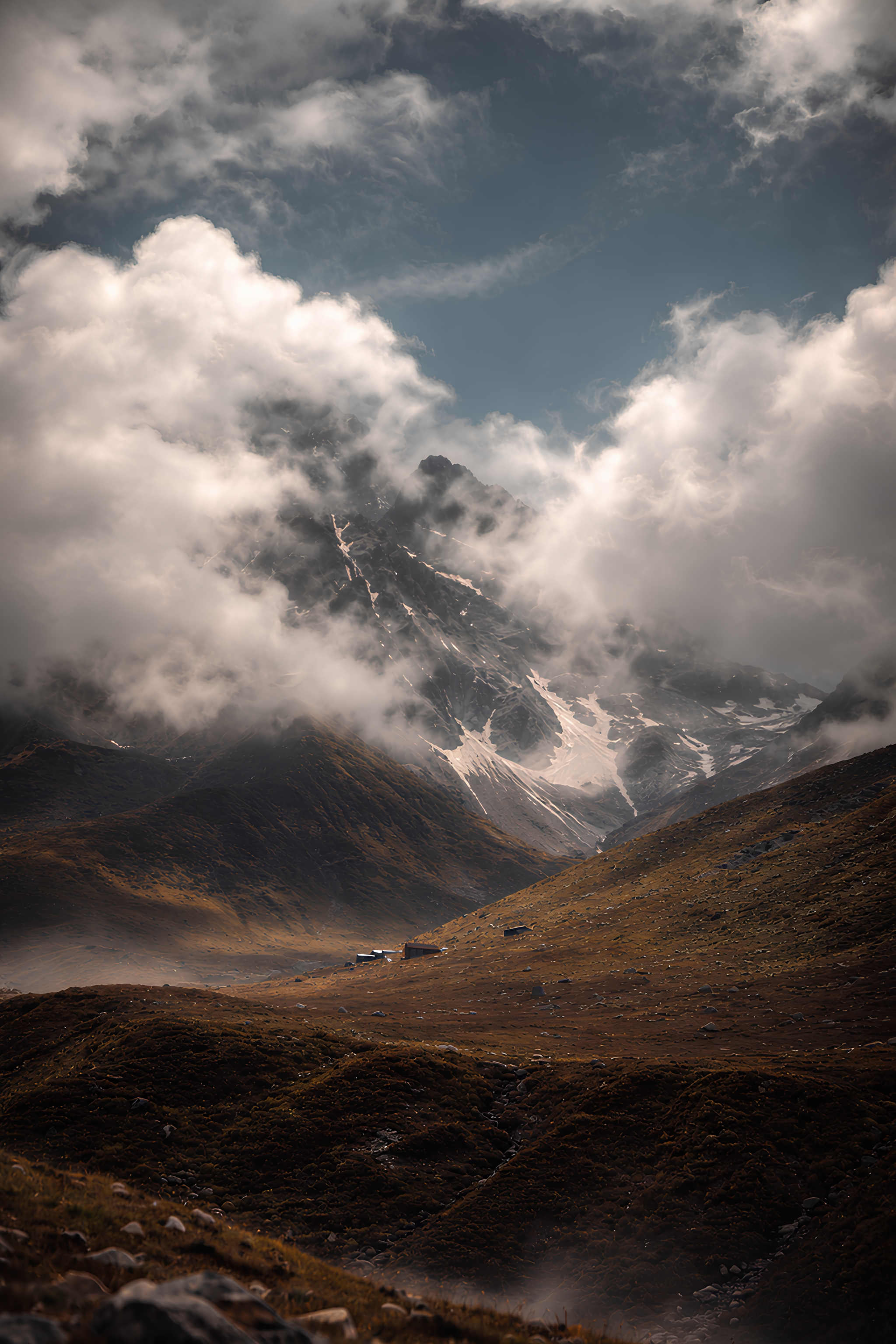 Majestic Mountain Landscape with Dramatic Clouds · Free Stock Photo