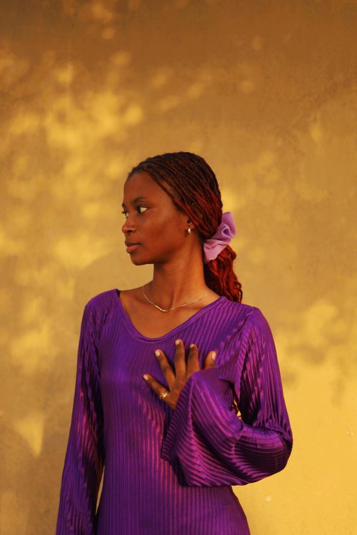 Elegant Portrait of Woman in Purple Dress · Free Stock Photo