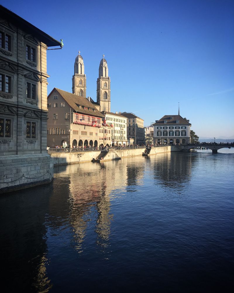 Historic Grossmünster in Zurich by the Limmat river