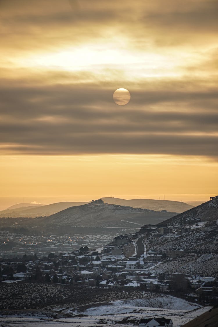 Snow Covered Mountain During Sunset