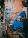 Urban Street Scene with Blue Delivery Van