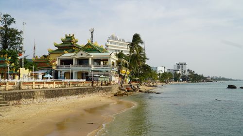 Free Beautiful temple by the beach in Phu Quoc, Vietnam showcasing traditional and modern architecture. Stock Photo