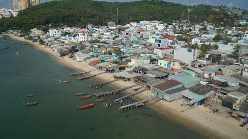 Free Discover the serene coastal village on Phu Quoc Island with vibrant houses and boats. Stock Photo