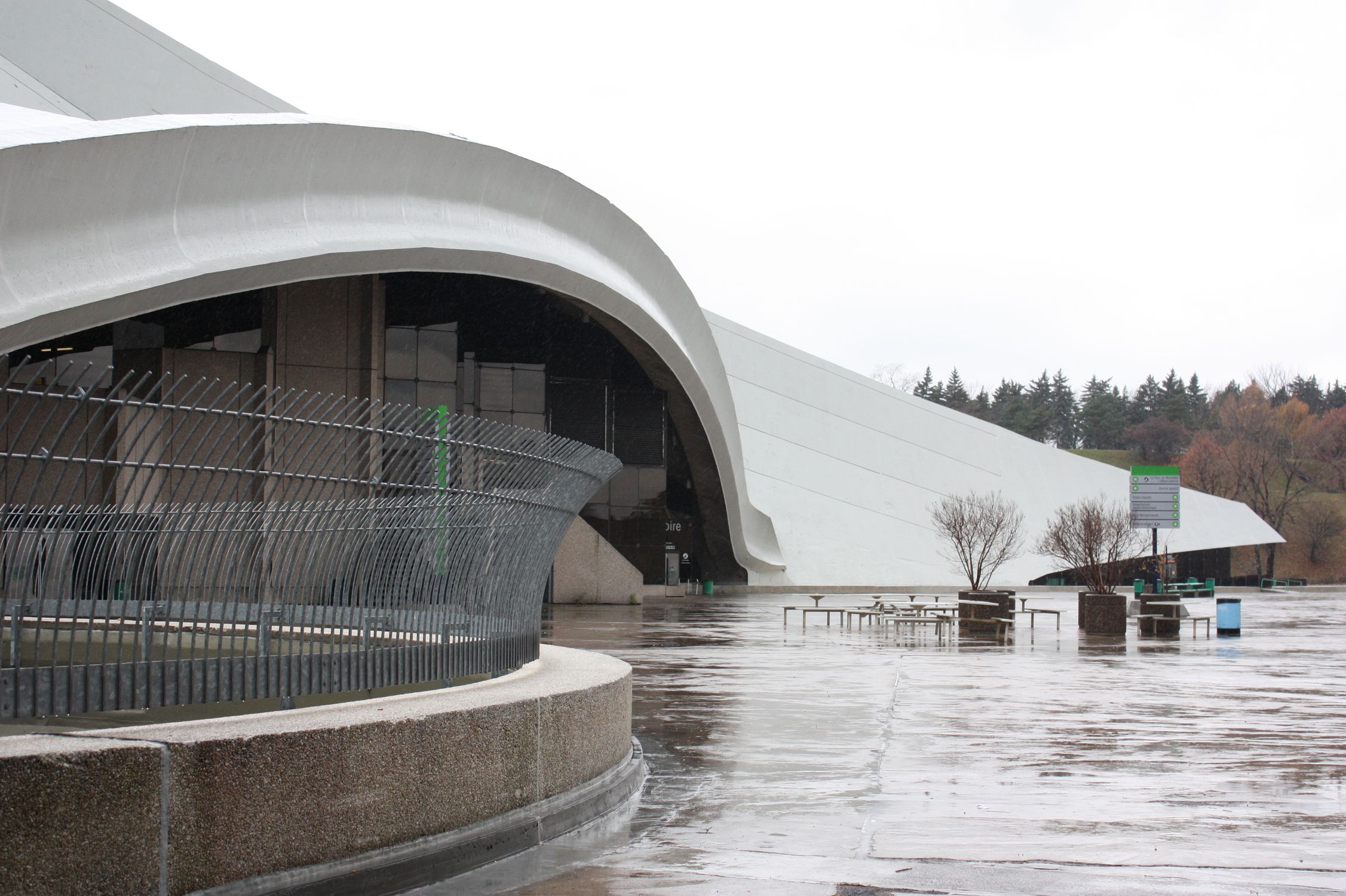 Modern Architecture with Curved Design in Rain · Free Stock Photo