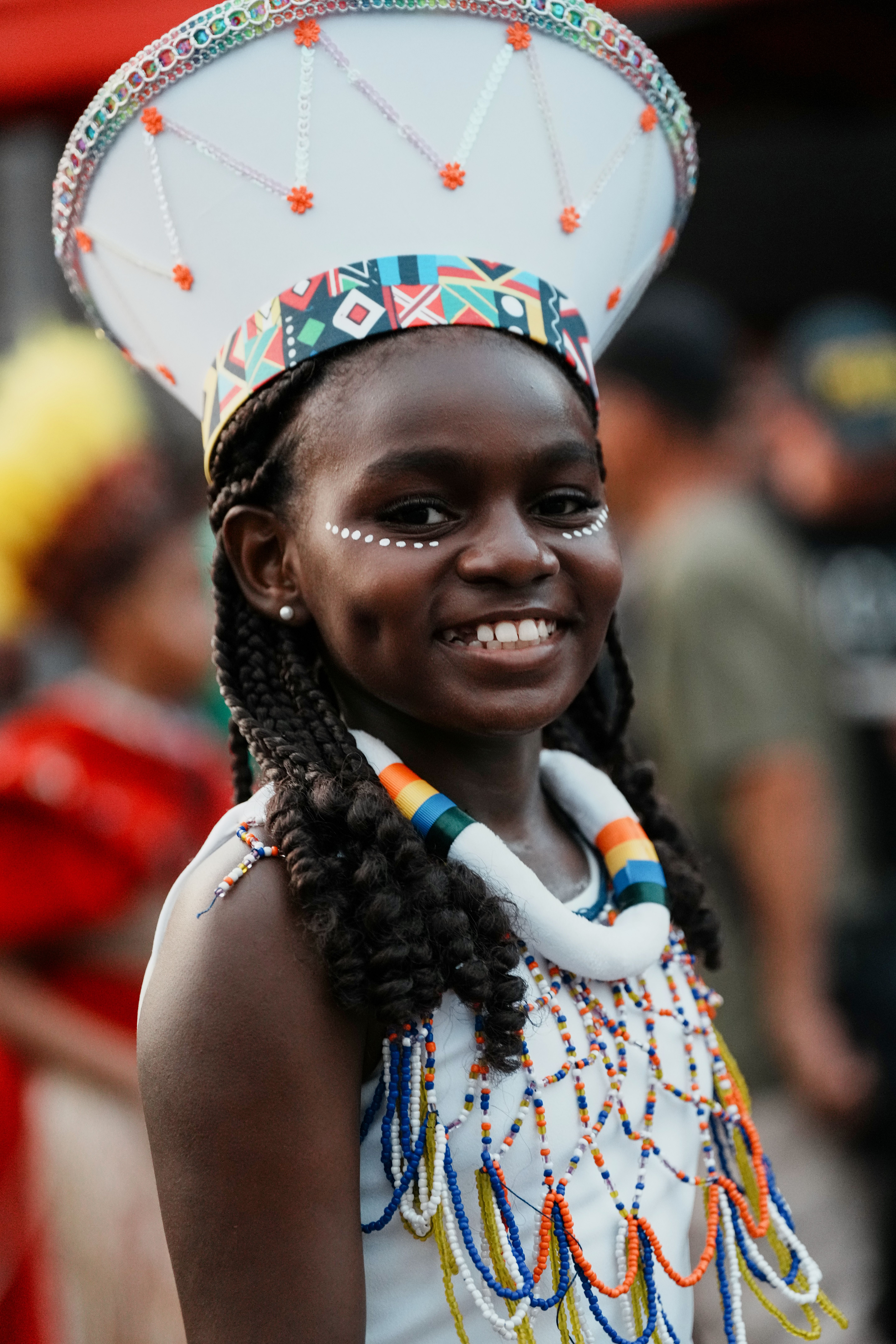 Smiling Girl in Traditional Caribbean Attire · Free Stock Photo
